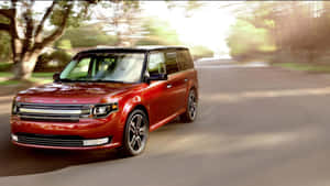 Sleek Ford Flex Suv On Scenic Road Wallpaper