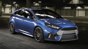 Sleek Ford Focus Cruising The City Streets Wallpaper