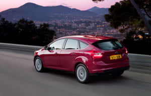 Sleek Ford Focus In An Urban Setting Wallpaper