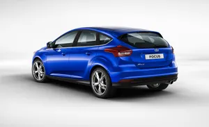 Sleek Ford Focus Parked At A Scenic Overlook Wallpaper