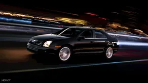 Sleek Ford Fusion In Action Wallpaper
