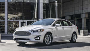 Sleek Ford Fusion Navigating City Streets Wallpaper