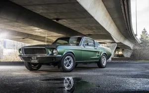 Sleek Ford Mustang Bullitt On The Open Road Wallpaper