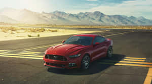 Sleek Ford Mustang California Special Cruising Down The Road Wallpaper