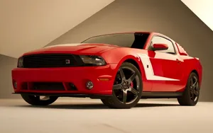 Sleek Ford Mustang Roush On Open Road Wallpaper