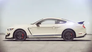 Sleek Ford Mustang Shelby Gt350 In Motion Wallpaper