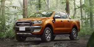 Sleek Ford Ranger Cruising On An Open Road Wallpaper