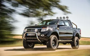 Sleek Ford Ranger Raptor On An Adventurous Off-road Journey Wallpaper