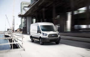 Sleek Ford Transit Van On The Road Wallpaper