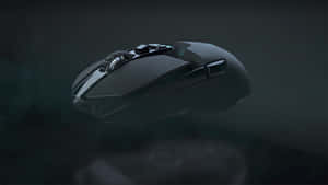 Sleek Gaming Mouse With Colorful Lights Wallpaper