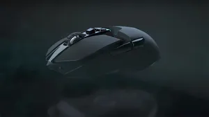 Sleek Gaming Mouse With Colorful Lights Wallpaper