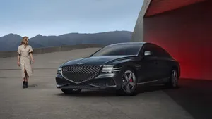 Sleek Genesis G80 In Motion Wallpaper