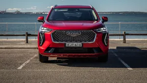 Sleek Haval Suv Cruising On The Open Road. Wallpaper