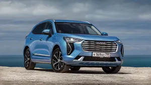 Sleek Haval Suv On A Scenic Road Wallpaper