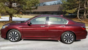 Sleek Honda Accord Parked With Urban Background Wallpaper