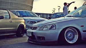 Sleek Honda Civic Del Sol On Scenic Roadway Wallpaper