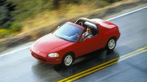 Sleek Honda Civic Del Sol On The Open Road Wallpaper