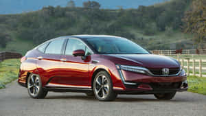 Sleek Honda Clarity On The Road Wallpaper