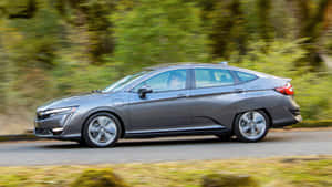 Sleek Honda Clarity On The Road Wallpaper