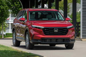 Sleek Honda Cr-v In A Vibrant Outdoor Setting Wallpaper