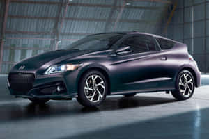 Sleek Honda Cr-z Parked In Urban Environment Wallpaper