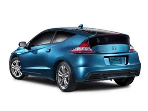 Sleek Honda Cr-z Sports Hybrid On The Road Wallpaper