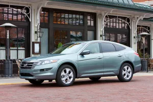 Sleek Honda Crosstour In A Stunning Natural Landscape Wallpaper