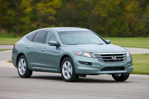 Sleek Honda Crosstour In Action Wallpaper