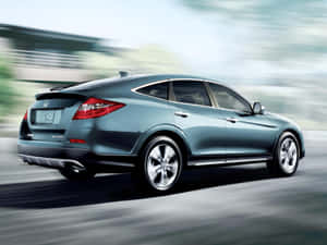 Sleek Honda Crosstour On Open Road Wallpaper