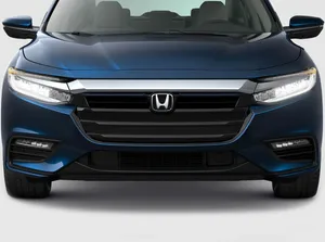 Sleek Honda Insight Hybrid On The Road Wallpaper