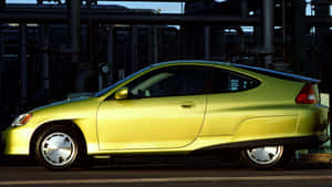 Sleek Honda Insight Hybrid On The Road Wallpaper