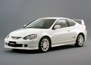 Sleek Honda Integra In A Beautiful Outdoor Setting Wallpaper