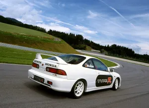 Sleek Honda Integra In Action Wallpaper