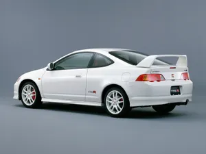 Sleek Honda Integra On The Road Wallpaper