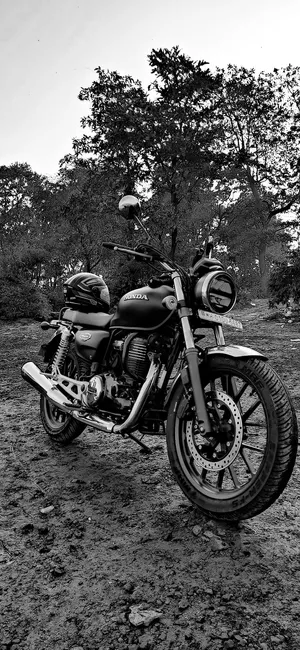 Sleek Honda Motorcycle In Dynamic Action Wallpaper