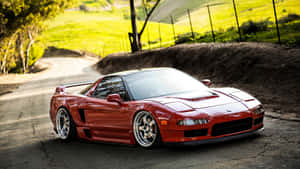 Sleek Honda Nsx In Striking Red Wallpaper