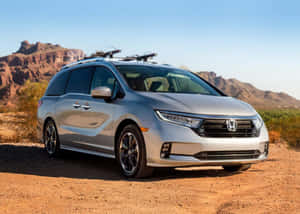 Sleek Honda Odyssey In A Picturesque Setting Wallpaper