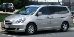 Sleek Honda Odyssey In Urban Environment Wallpaper