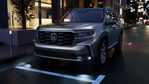 Sleek Honda Pilot Cruising On The Road Wallpaper