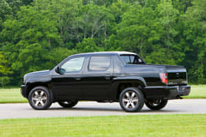 Sleek Honda Ridgeline In Motion Wallpaper