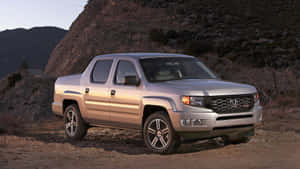 Sleek Honda Ridgeline On Scenic Road Wallpaper