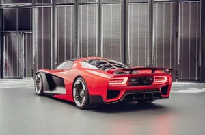 Sleek Hongqi Luxury Vehicle Parked In A Serene Setting. Wallpaper