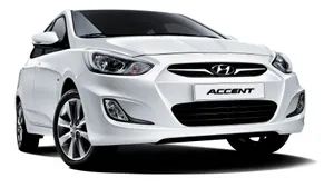 Sleek Hyundai Accent In Motion Wallpaper