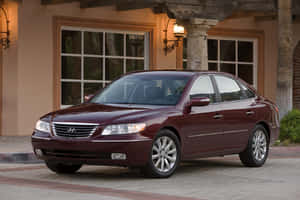 Sleek Hyundai Azera Glides On The Open Road Wallpaper