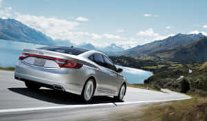 Sleek Hyundai Azera In Motion On A Scenic Route Wallpaper