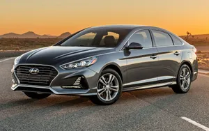 Sleek Hyundai Azera On A Scenic Route Wallpaper