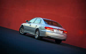 Sleek Hyundai Azera On The Open Road Wallpaper