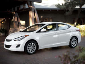 Sleek Hyundai Elantra Cruising The Streets Wallpaper