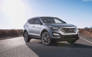 Sleek Hyundai Santa Fe In A Stunning Landscape Wallpaper