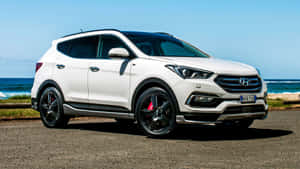 Sleek Hyundai Santa Fe On Scenic Landscape Wallpaper